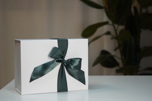Gift box with black bow