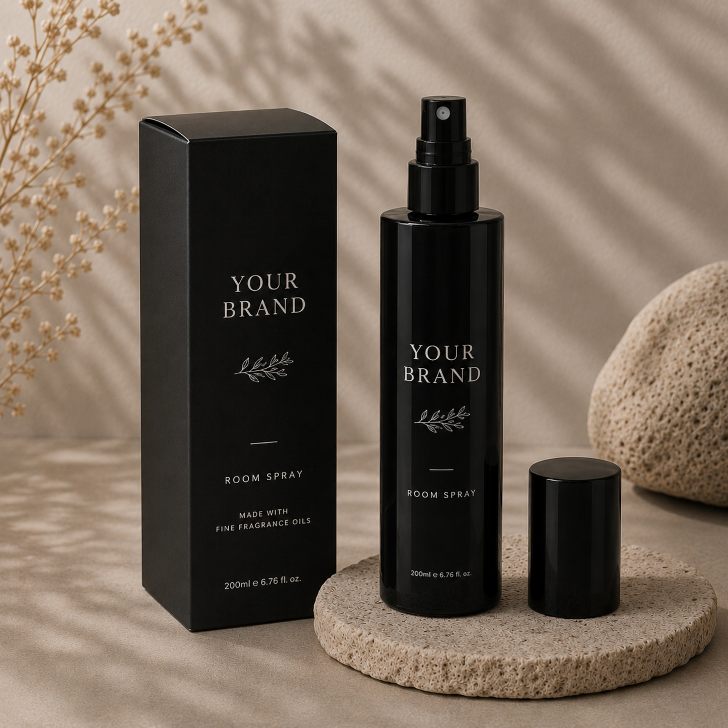 Black room spray bottle and packaging with 'Your Brand' on a neutral background