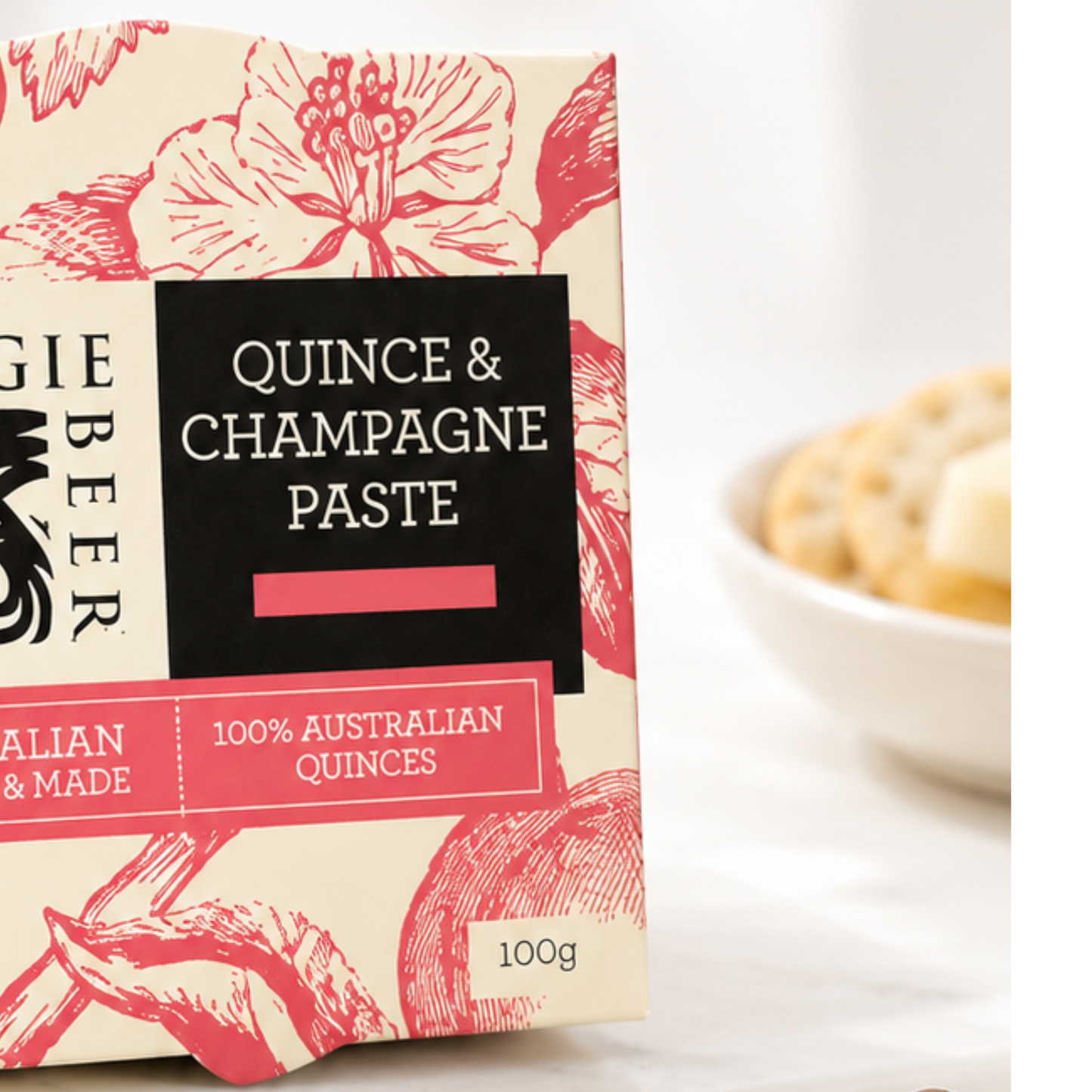 Box of Angie Beer Quince & Champagne Paste with floral design