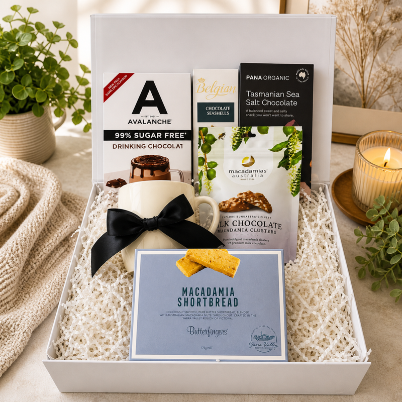 settlement box with chocolate and shortbread and cup