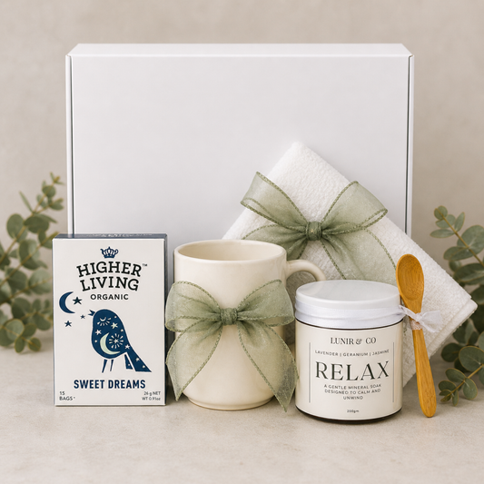 Gift box with sweet dreams tea, white cup and relax bath soak
