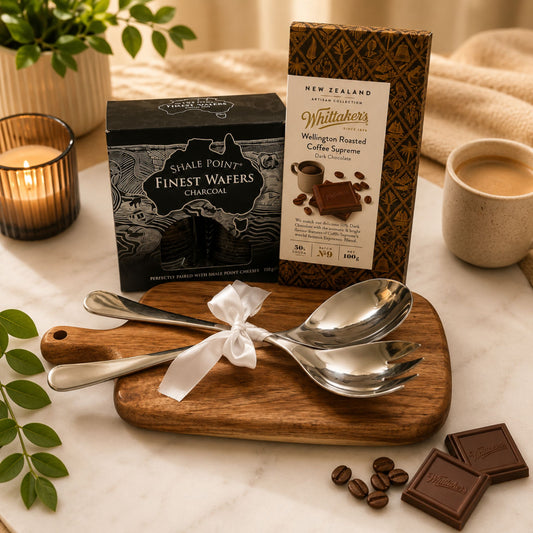 Table setting with Whittaker's chocolate, Shale Point wafers, and coffee beans.