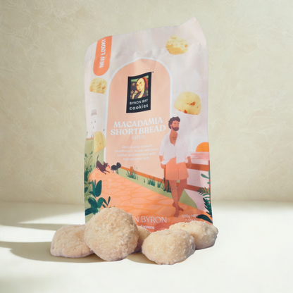 Bag of Byron Bay Cookies Macadamia Shortbread with cookies in front on a light background