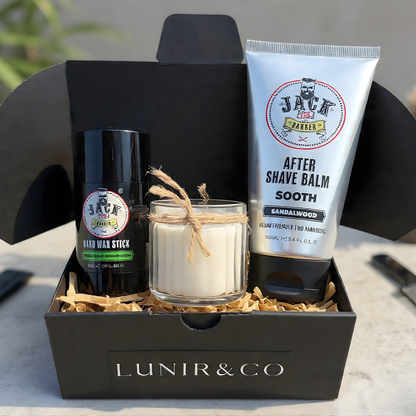 Barber & Co forming cream, Lunir & Co black ash soap, and a scrubber on a marble surface.