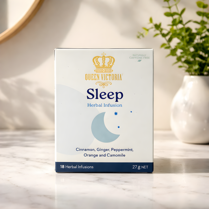 Box of Queen Victoria Sleep Herbal Infusion on a marble surface with a plant in the background