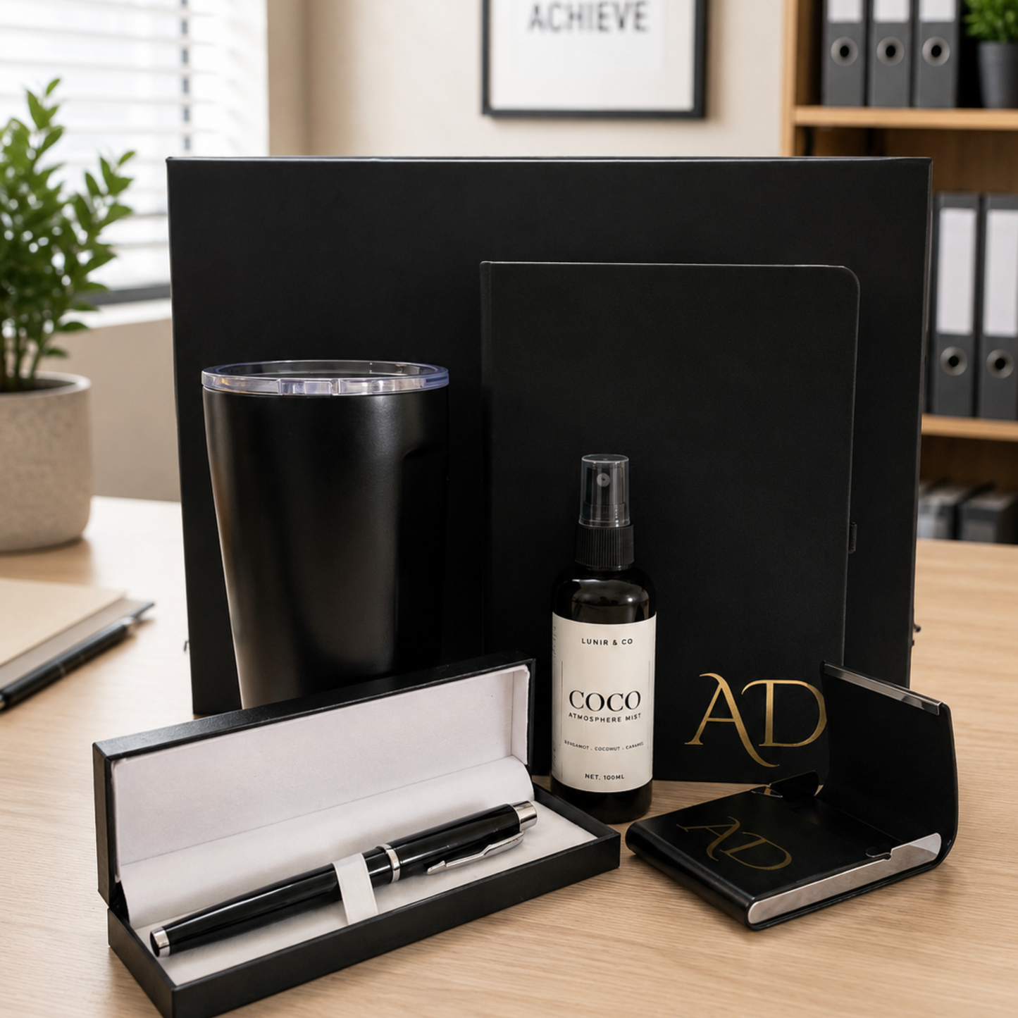 Collection of office supplies including a pen, mug, and desk accessories on a desk.