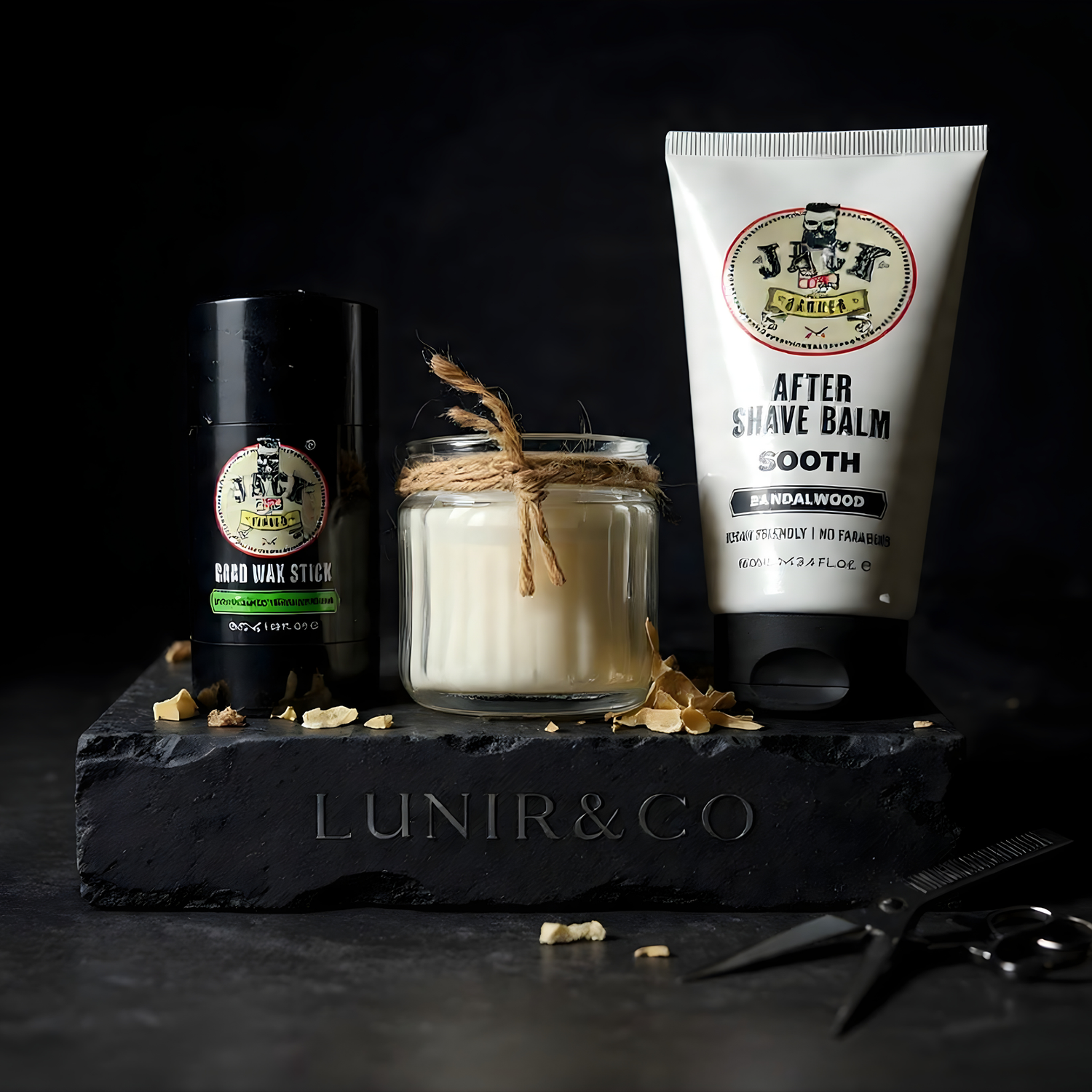 Grooming products including a candle, jar, and tube of aftershave balm on a dark surface with 'LUNIR&CO' branding.