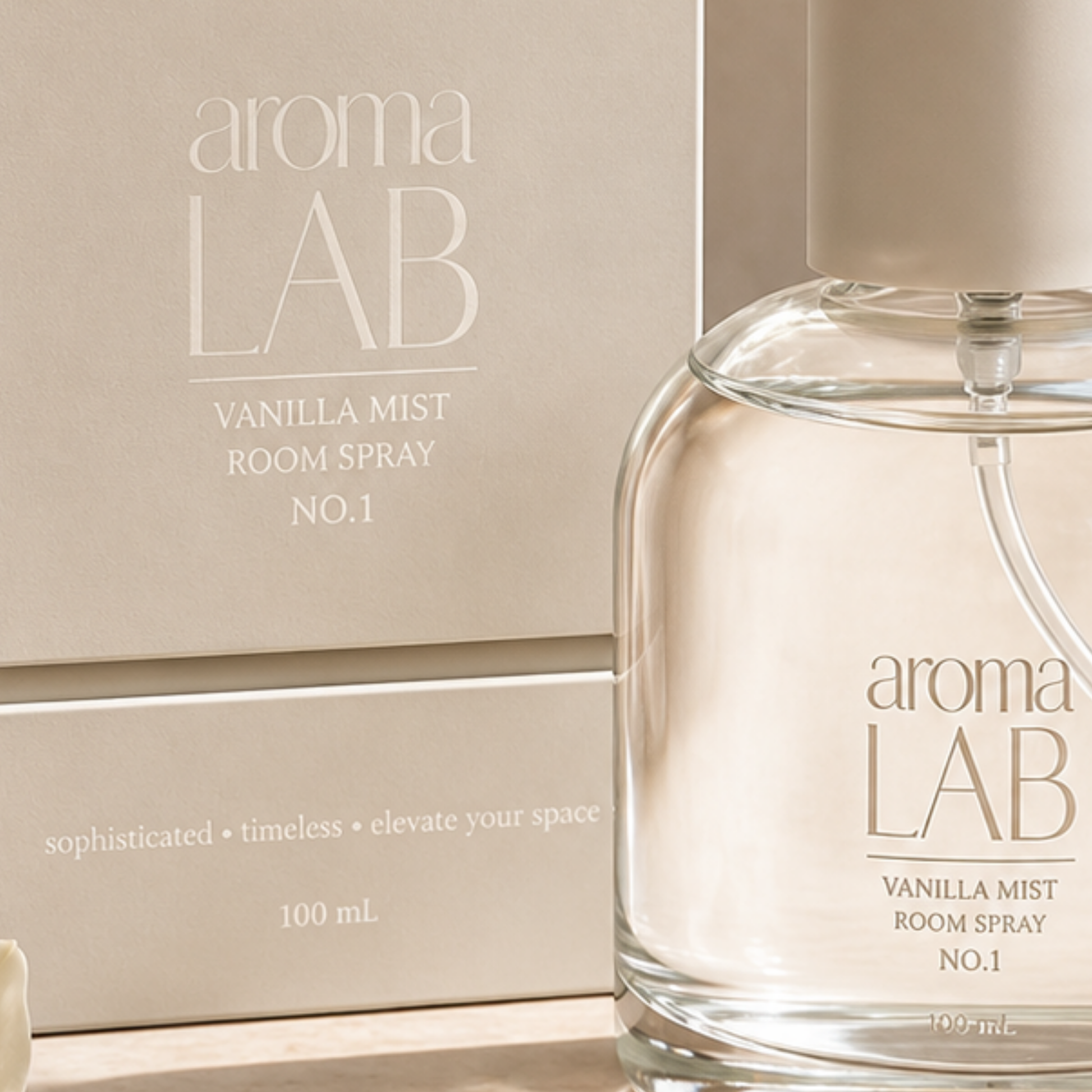 Aroma Lab Vanilla Mist room spray with packaging on a neutral background