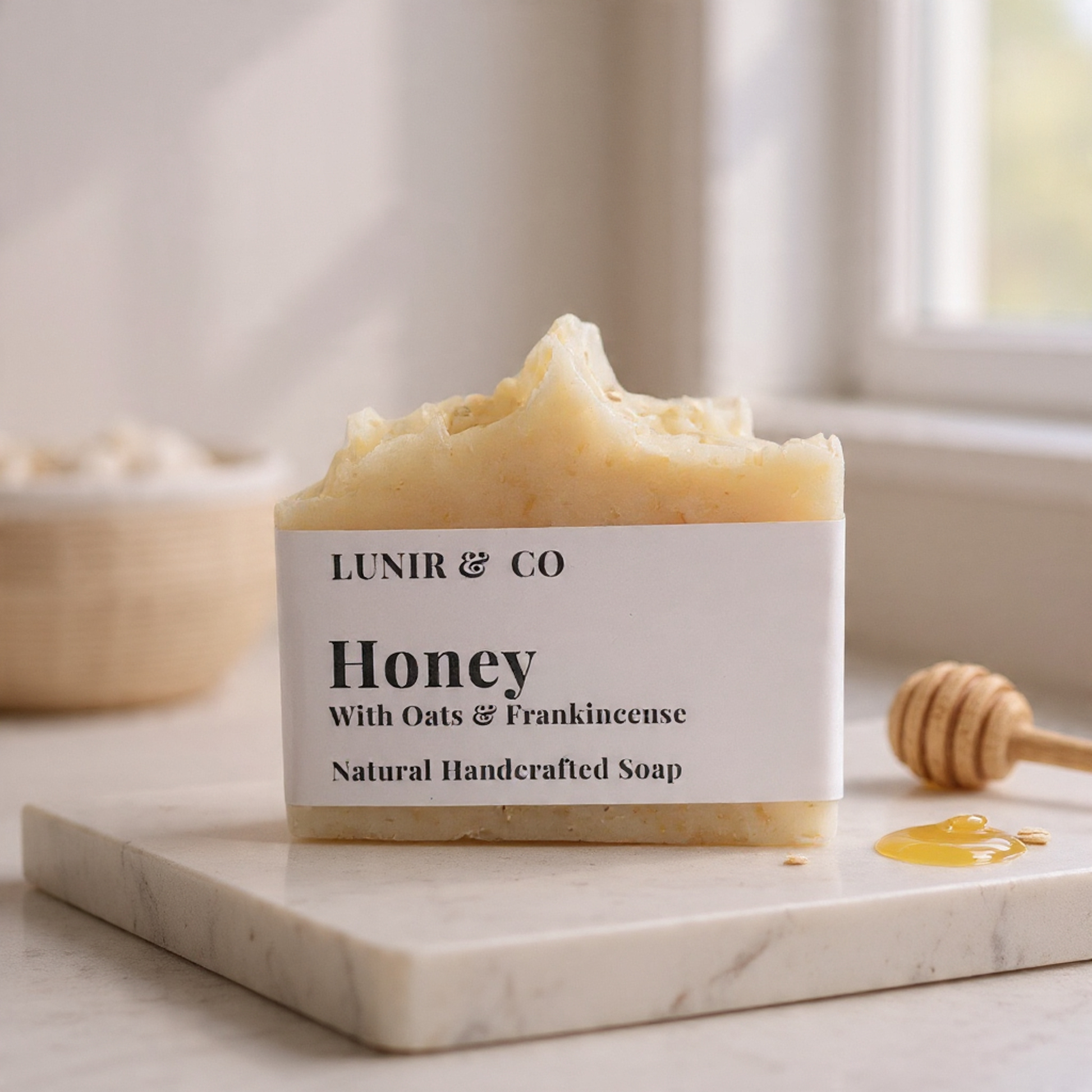 Handcrafted soap bar with 'LUNIR & CO' branding on a marble surface.